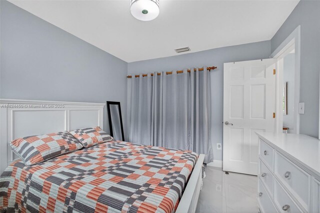 8905 NW 112th St, Hialeah Gardens, FL 33018 - bedroom featuring light marble finish flooring