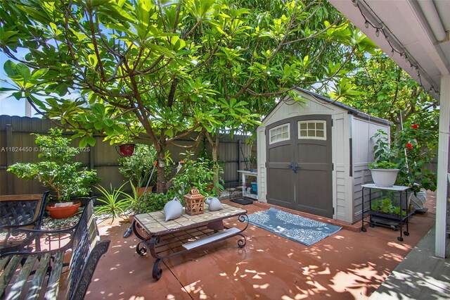 8905 NW 112th St, Hialeah Gardens, FL 33018 - view of shed featuring a fenced backyard