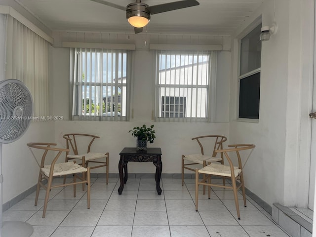 217 E 20th St, Hialeah, FL 33010 - living area featuring a ceiling fan and tile patterned flooring