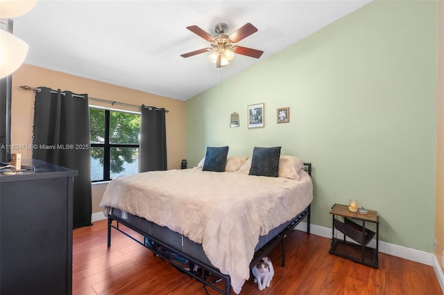 602 Lincoln Ct Unit 602, Deerfield Beach, FL 33442 - bedroom featuring vaulted ceiling, wood finished floors, and a ceiling fan