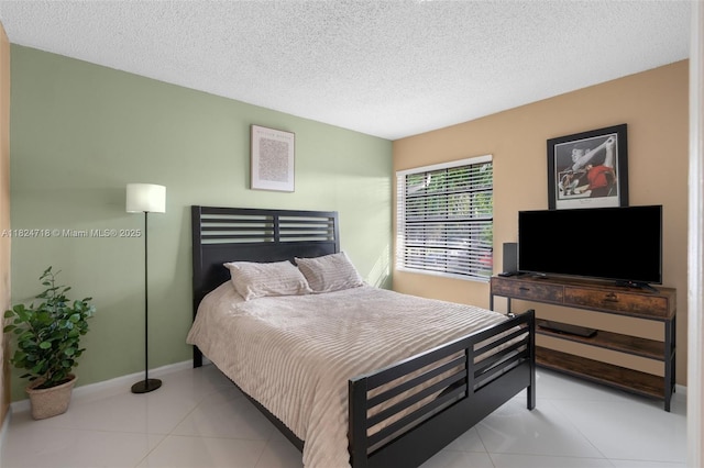 602 Lincoln Ct Unit 602, Deerfield Beach, FL 33442 - tiled bedroom with a textured ceiling and baseboards