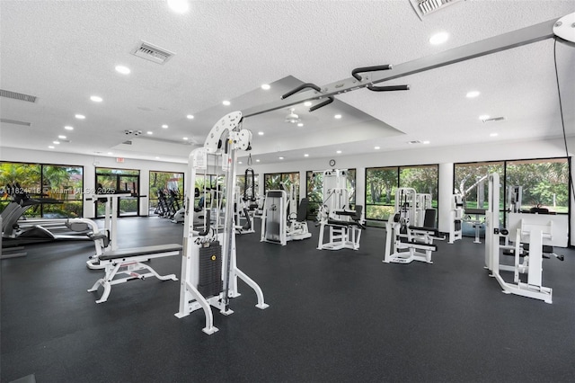 602 Lincoln Ct Unit 602, Deerfield Beach, FL 33442 - workout area with a textured ceiling and recessed lighting