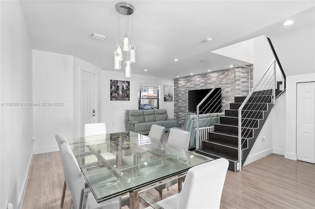 8880 W 35th Ct, Hialeah, FL 33018 - dining area featuring recessed lighting, light wood-style floors, and stairs