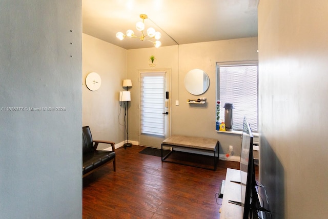 8420 Byron Ave Unit 6, Miami Beach, FL 33141 - foyer entrance with wood finished floors and a chandelier