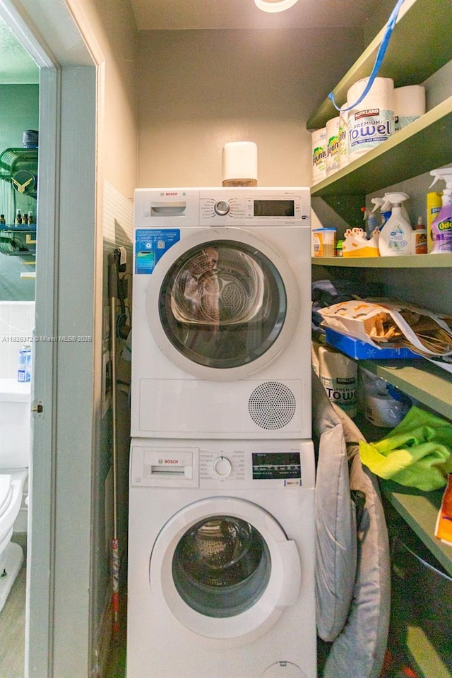 8420 Byron Ave Unit 6, Miami Beach, FL 33141 - laundry area with estacked washer and dryer