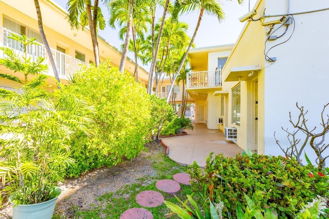8420 Byron Ave Unit 6, Miami Beach, FL 33141 - view of yard with a patio