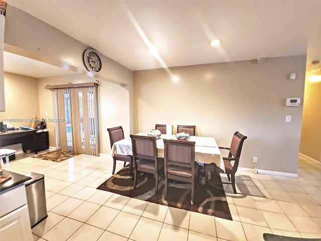 7301 SW 8th St, North Lauderdale, FL 33068 - dining area with light tile patterned flooring and baseboards