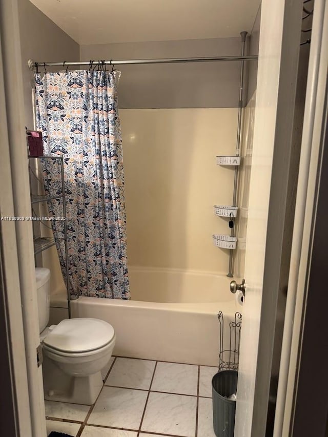 7301 SW 8th St, North Lauderdale, FL 33068 - full bath featuring shower / bath combo with shower curtain and tile patterned floors