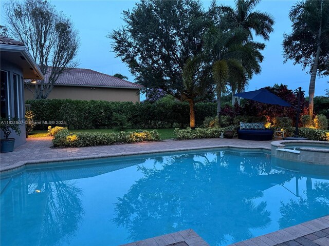 12608 S Stonebrook Cir, Davie, FL 33330 - view of pool with a pool with connected hot tub