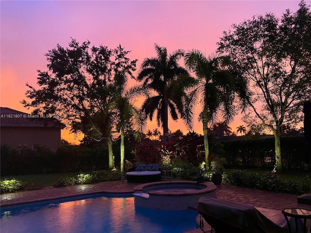 12608 S Stonebrook Cir, Davie, FL 33330 - view of pool with a pool with connected hot tub
