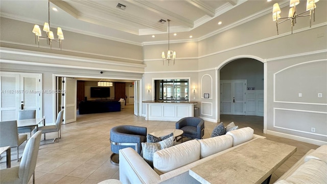 12608 S Stonebrook Cir, Davie, FL 33330 - living room featuring a chandelier, crown molding, light tile patterned floors, a high ceiling, and arched walkways