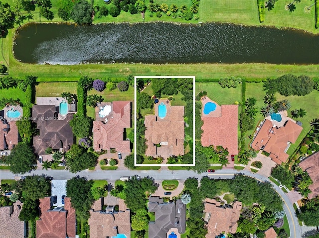 12608 S Stonebrook Cir, Davie, FL 33330 - aerial view of property and surrounding area featuring property parcel outlined and nearby suburban area