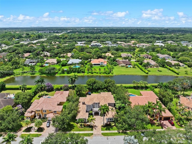 12608 S Stonebrook Cir, Davie, FL 33330 - aerial perspective of suburban area with a nearby body of water