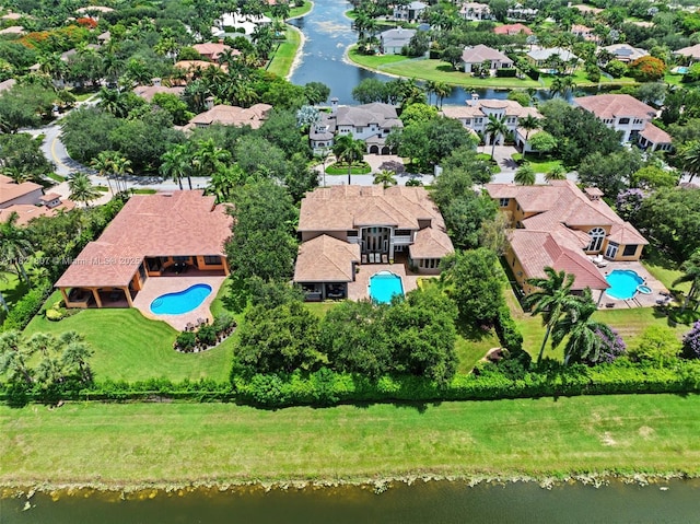 12608 S Stonebrook Cir, Davie, FL 33330 - aerial view of residential area featuring a pool area and a nearby body of water