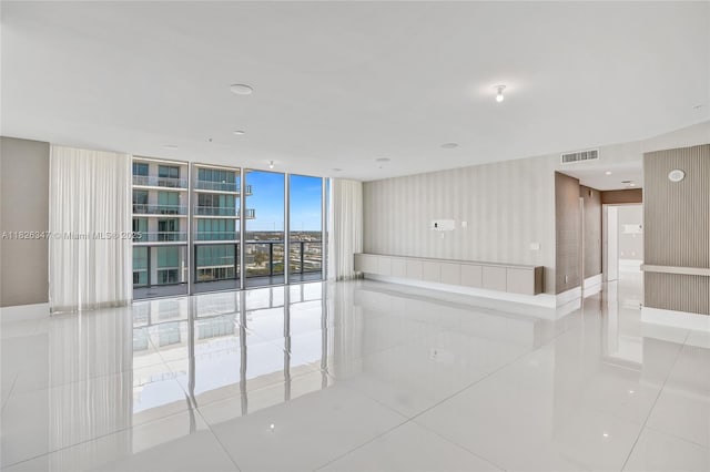 300 Sunny Isles Blvd Unit 4-Ts-04, Sunny Isles Beach, FL 33160 - tiled spare room with a wall of windows
