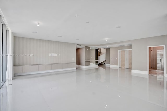 300 Sunny Isles Blvd Unit 4-Ts-04, Sunny Isles Beach, FL 33160 - spare room featuring light tile patterned floors and stairway