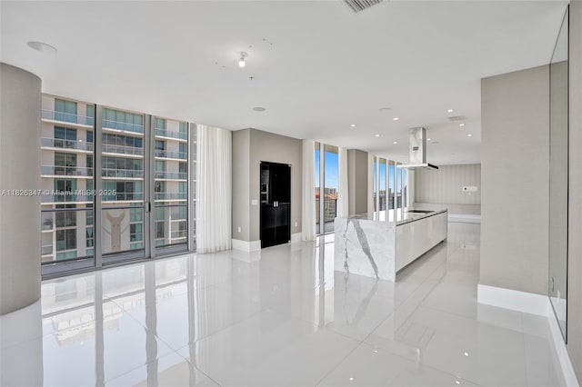 300 Sunny Isles Blvd Unit 4-Ts-04, Sunny Isles Beach, FL 33160 - unfurnished living room featuring floor to ceiling windows, light tile patterned flooring, and recessed lighting
