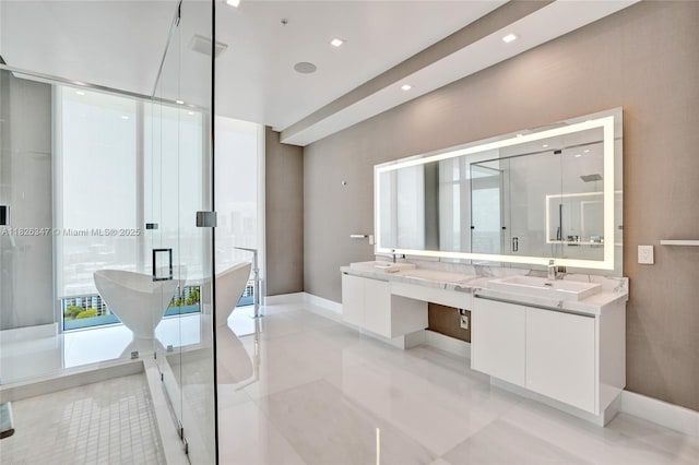 300 Sunny Isles Blvd Unit 4-Ts-04, Sunny Isles Beach, FL 33160 - bathroom with double vanity, a freestanding tub, a shower stall, tile patterned flooring, and recessed lighting