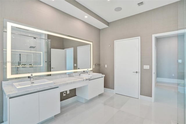 300 Sunny Isles Blvd Unit 4-Ts-04, Sunny Isles Beach, FL 33160 - bathroom featuring double vanity, a shower stall, and tile patterned flooring