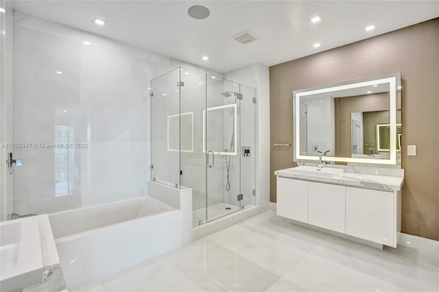 300 Sunny Isles Blvd Unit 4-Ts-04, Sunny Isles Beach, FL 33160 - bathroom featuring a bath, a stall shower, vanity, and recessed lighting
