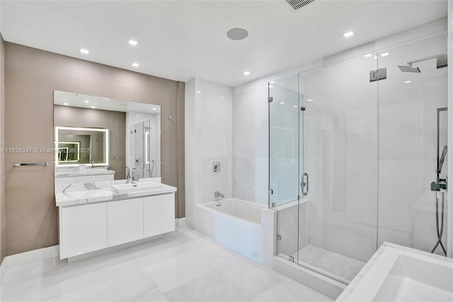300 Sunny Isles Blvd Unit 4-Ts-04, Sunny Isles Beach, FL 33160 - bathroom with vanity, a garden tub, a stall shower, and recessed lighting