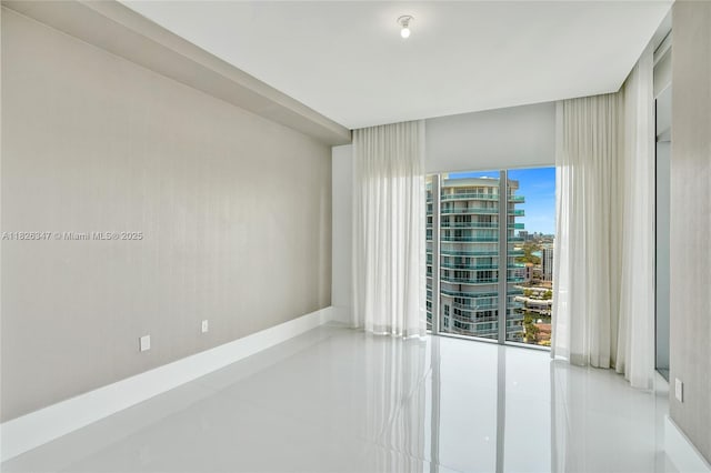 300 Sunny Isles Blvd Unit 4-Ts-04, Sunny Isles Beach, FL 33160 - empty room with tile patterned floors and a city view