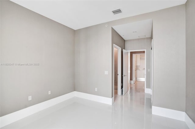 300 Sunny Isles Blvd Unit 4-Ts-04, Sunny Isles Beach, FL 33160 - tiled spare room featuring baseboards