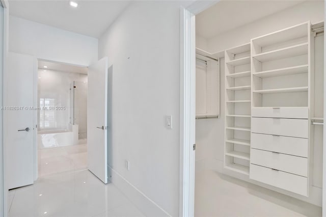 300 Sunny Isles Blvd Unit 4-Ts-04, Sunny Isles Beach, FL 33160 - walk in closet featuring tile patterned floors