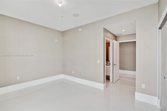 300 Sunny Isles Blvd Unit 4-Ts-04, Sunny Isles Beach, FL 33160 - empty room featuring tile patterned floors and baseboards