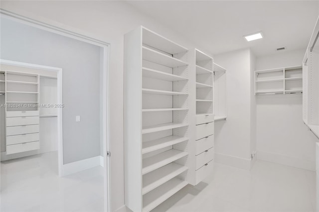 300 Sunny Isles Blvd Unit 4-Ts-04, Sunny Isles Beach, FL 33160 - spacious closet featuring tile patterned flooring