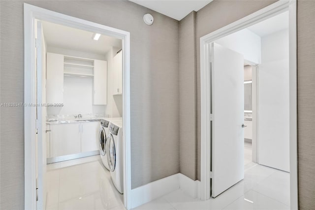 300 Sunny Isles Blvd Unit 4-Ts-04, Sunny Isles Beach, FL 33160 - laundry area with washer and clothes dryer and light tile patterned flooring
