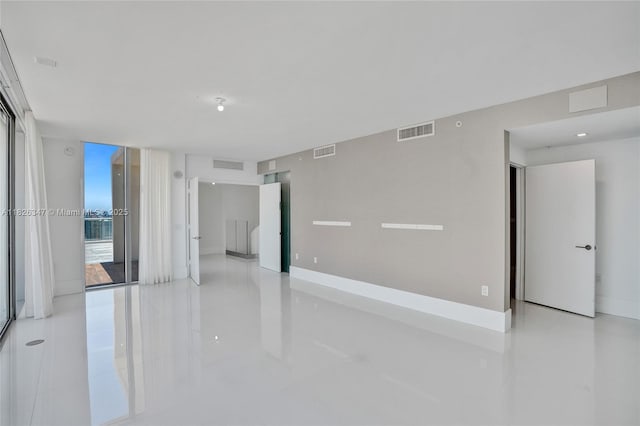 300 Sunny Isles Blvd Unit 4-Ts-04, Sunny Isles Beach, FL 33160 - unfurnished room with light tile patterned flooring and baseboards