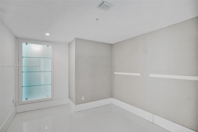 300 Sunny Isles Blvd Unit 4-Ts-04, Sunny Isles Beach, FL 33160 - empty room featuring tile patterned floors and fire sprinkler in ceiling