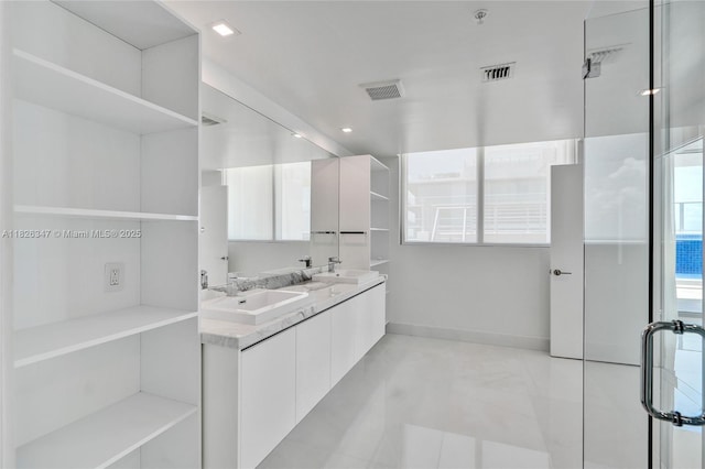 300 Sunny Isles Blvd Unit 4-Ts-04, Sunny Isles Beach, FL 33160 - bathroom featuring double vanity and tile patterned floors