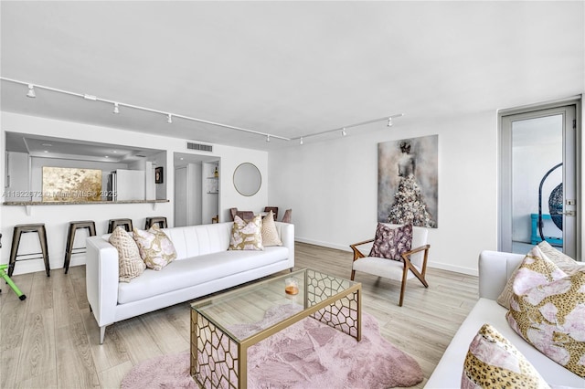 11 Island Ave Unit 1103, Miami Beach, FL 33139 - living area with rail lighting and wood finished floors