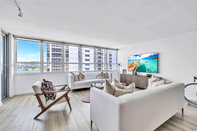 11 Island Ave Unit 1103, Miami Beach, FL 33139 - living room with light wood-type flooring