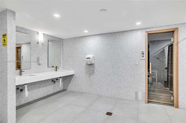 11 Island Ave Unit 1103, Miami Beach, FL 33139 - full bath with tile patterned floors, double vanity, and a shower with door