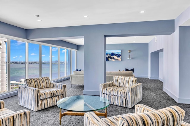 11 Island Ave Unit 1103, Miami Beach, FL 33139 - carpeted living area with a water view, plenty of natural light, and recessed lighting