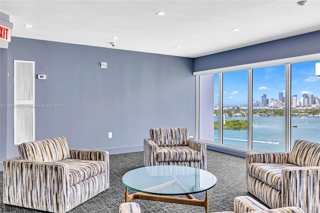 11 Island Ave Unit 1103, Miami Beach, FL 33139 - carpeted living room featuring a skyline view, recessed lighting, and a water view
