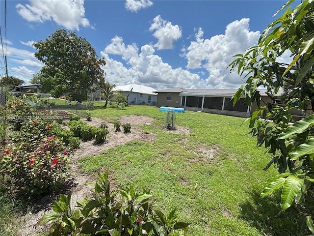 27064 Omni Ln, Punta Gorda, FL 33983 - view of yard featuring a sunroom