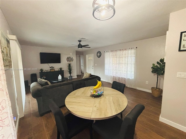27064 Omni Ln, Punta Gorda, FL 33983 - dining area with dark wood-type flooring and a ceiling fan