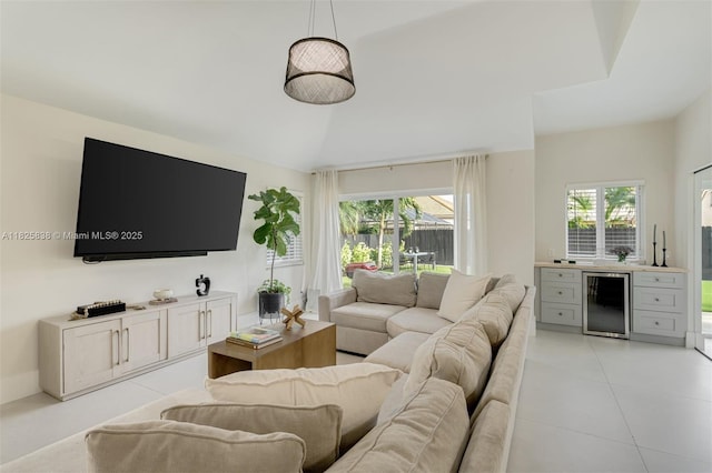 9248 Magnolia Ct, Davie, FL 33328 - living room with beverage cooler, healthy amount of natural light, light tile patterned floors, and bar