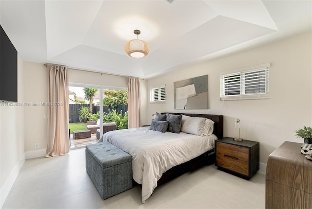 9248 Magnolia Ct, Davie, FL 33328 - bedroom with a raised ceiling and access to exterior