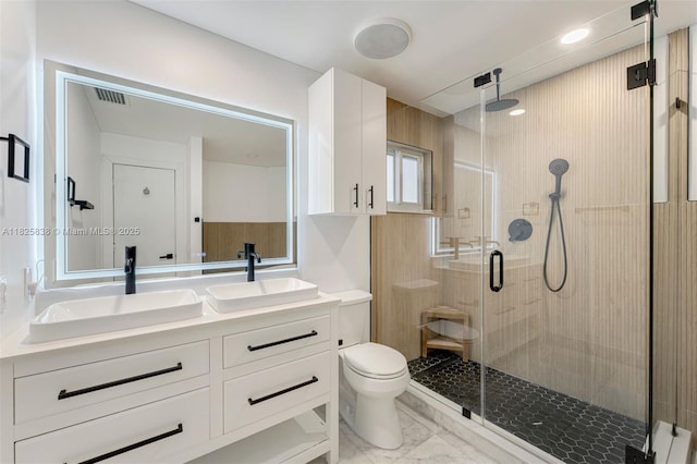 9248 Magnolia Ct, Davie, FL 33328 - bathroom with a stall shower, double vanity, and marble finish floors