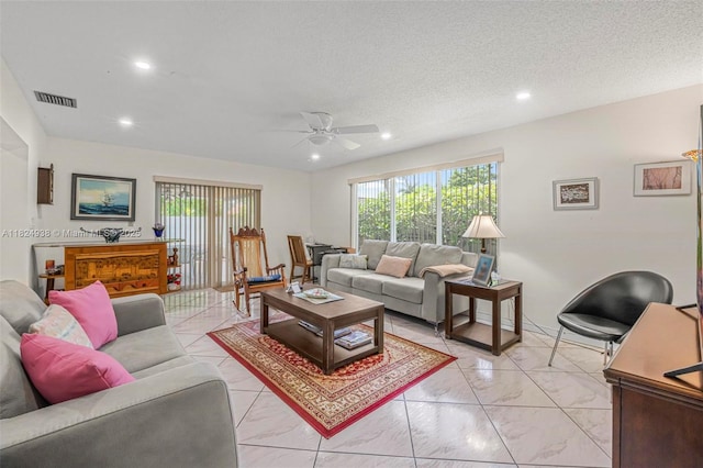 13245 SW 86th Ln, Miami, FL 33183 - living room featuring light marble finish floors, a ceiling fan, recessed lighting, and a textured ceiling