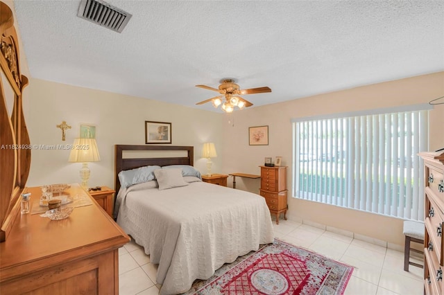 13245 SW 86th Ln, Miami, FL 33183 - bedroom featuring a textured ceiling, light tile patterned flooring, and ceiling fan