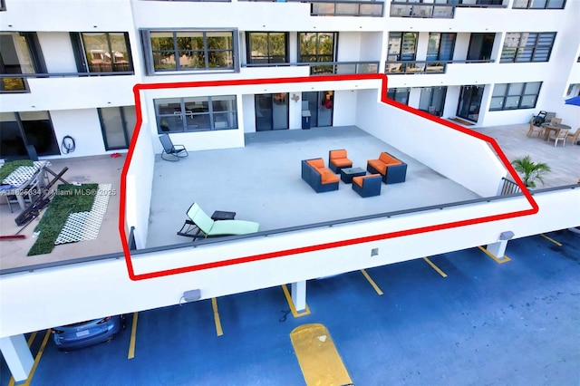 2555 Collins Ave Unit 606, Miami Beach, FL 33140 - view of community with an outdoor hangout area