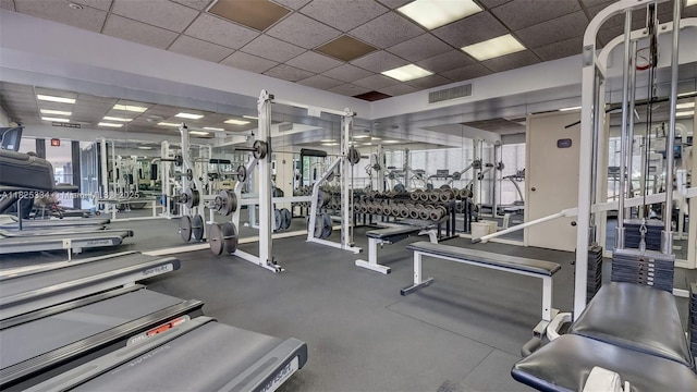 2555 Collins Ave Unit 606, Miami Beach, FL 33140 - gym with a drop ceiling