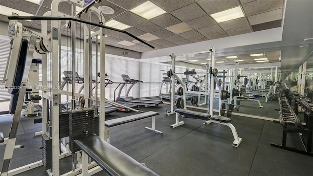 2555 Collins Ave Unit 606, Miami Beach, FL 33140 - workout area featuring a drop ceiling