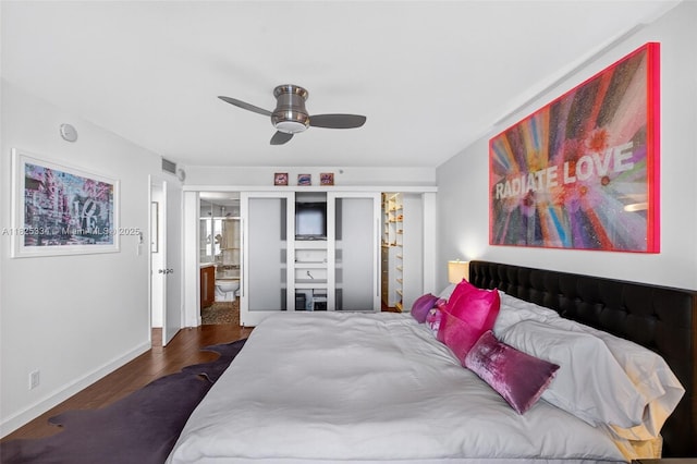 2555 Collins Ave Unit 606, Miami Beach, FL 33140 - bedroom featuring wood finished floors and a ceiling fan